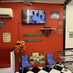 Oldies Laundromat - Kids reading area & TV.