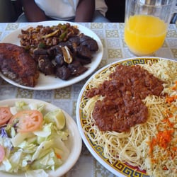 Ethiopia & Somalia Restaurant - Fish, goat, beef, and salad served with spaghetti and rice... a lot of delicious food!