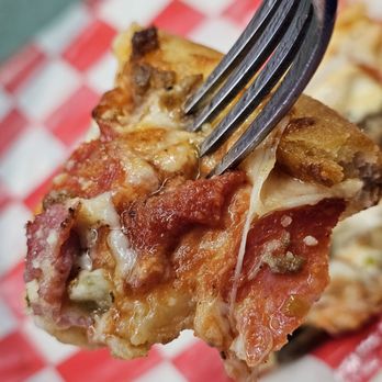 Porta Bella Pizza - A fork with a piece of pizza. - Pizza Near Me - Roanoke, Virginia Porta Bella Pizza - A fork with a piece of pizza. - Pizza Near Me - Roanoke, Virginia