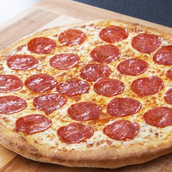 241 Pizza - a pepperoni pizza on a cutting board - Pizza Near Me - Trenton, Ontario