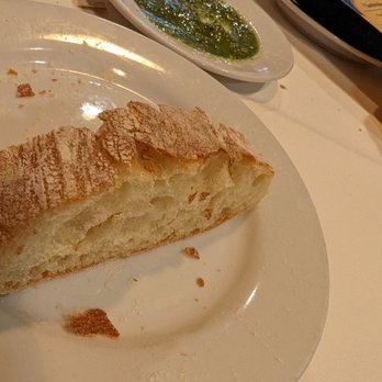 Mozaic - Complimentary bread and parsley sauce - Mediterranean Near Me - Santa Cruz, California Mozaic - Complimentary bread and parsley sauce - Mediterranean Near Me - Santa Cruz, California