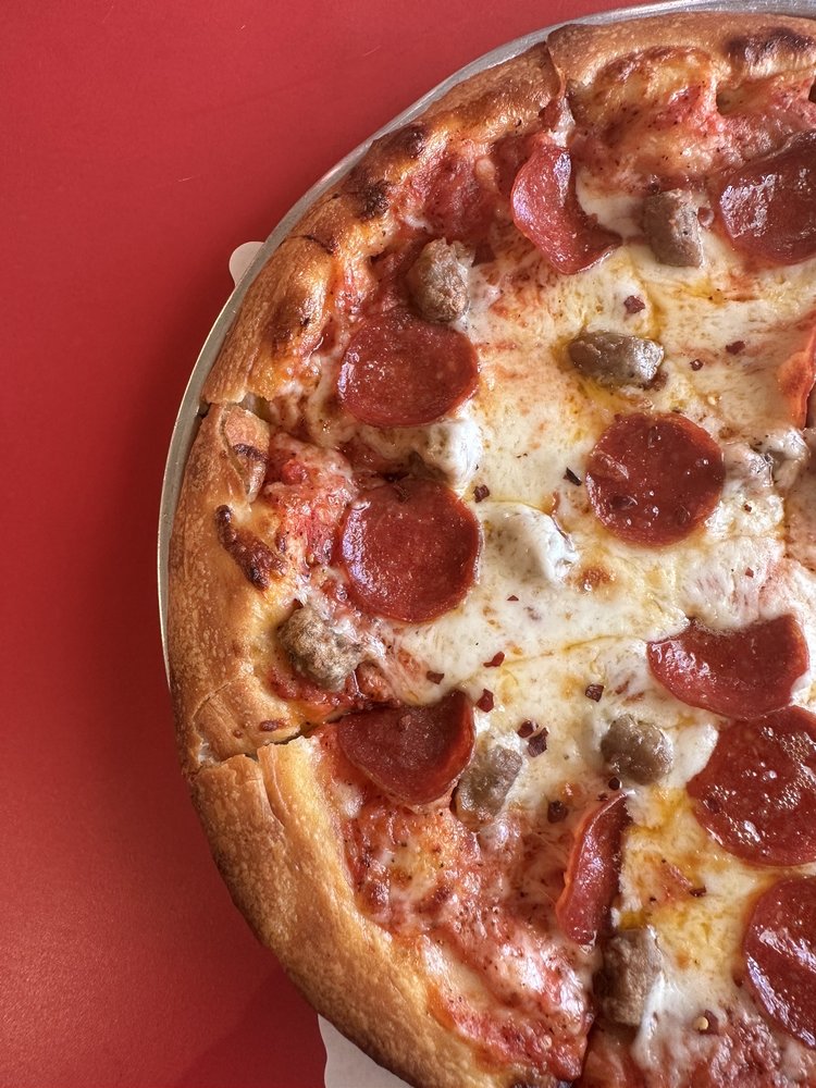 The Pizza Barn Logo