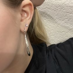 Claire's - Second lobe ear piercing.