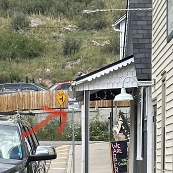 Hungry Goat Scratch Kitchen & Wine Bar - Pathetic pay for parking sign at end of block. - Wine Bars Near Me - Morrison, Colorado Hungry Goat Scratch Kitchen & Wine Bar - Pathetic pay for parking sign at end of block. - Wine Bars Near Me - Morrison, Colorado