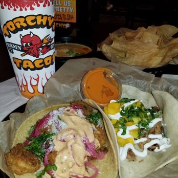 Torchy's Tacos - Fried shrimp taco and Caribbean chicken taco. - Tacos Near Me - Phoenix, Arizona Torchy's Tacos - Fried shrimp taco and Caribbean chicken taco. - Tacos Near Me - Phoenix, Arizona