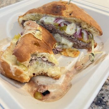The Lunch Spot - #21 G's Roast Beef, Ortega Chilies, Onion, Melted Pepper Jack and Swiss Cheese, Garlic Aioli, grilled on Ciabatta with a side of Au Jus - Salad Near Me - Palm Desert, California The Lunch Spot - #21 G's Roast Beef, Ortega Chilies, Onion, Melted Pepper Jack and Swiss Cheese, Garlic Aioli, grilled on Ciabatta with a side of Au Jus - Salad Near Me - Palm Desert, California