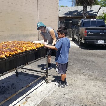 Tacos La Piedad - My son and I checking out the grill! - Chicken Shop Near Me - Sacramento, California Tacos La Piedad - My son and I checking out the grill! - Chicken Shop Near Me - Sacramento, California