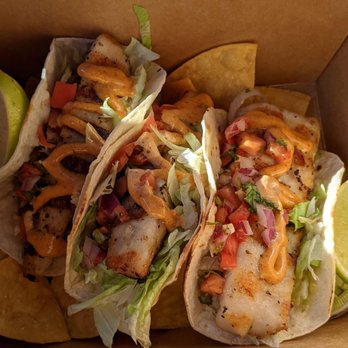 Catch Oyster Bar - Grilled red snapper tacos served with tortilla and guacamole - Seafood Near Me - Patchogue, New York