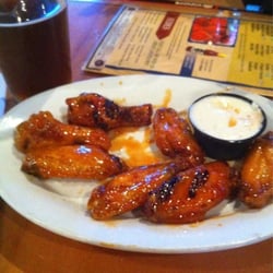 Gator's Dockside of Gainesville - Scooter grilled wings re-tossed w/ an ice cold Amber Bock! 10 stars