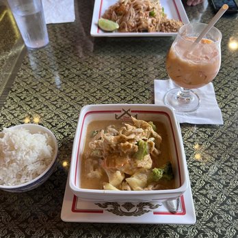 Thai Thai Bistro & Bar - Thai Thai curry and a Thai tea. Pad thai in the background - Thai Near Me - Volcano, Hawaii Thai Thai Bistro & Bar - Thai Thai curry and a Thai tea. Pad thai in the background - Thai Near Me - Volcano, Hawaii
