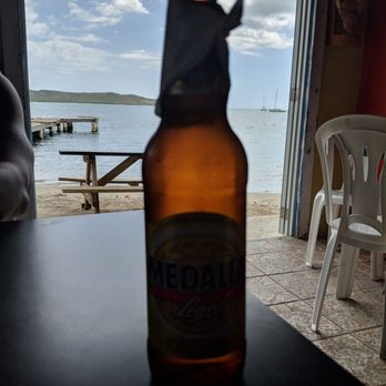 Los Remos Restaurant & Beach Club - Bad picture of my medalla - Bars Near Me - Boquerón, Puerto Rico Los Remos Restaurant & Beach Club - Bad picture of my medalla - Bars Near Me - Boquerón, Puerto Rico