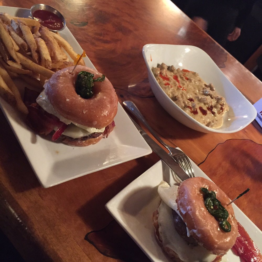 Raven Cafe - Raven burgers: 1 with bacon & 1 with bacon the the side... behind: biscuits & gravy. Great Sunday brunch menu with bottomless mimosas! - Sandwiches Near Me - Prescott, Arizona Raven Cafe - Raven burgers: 1 with bacon & 1 with bacon the the side... behind: biscuits & gravy. Great Sunday brunch menu with bottomless mimosas! - Sandwiches Near Me - Prescott, Arizona