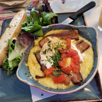 First Watch - Pork Belly and Grits....Delicious seasonal item for the winter. Tender pork belly, creamy grits and topped with a poached egg - Breakfast & Brunch Near Me - Jacksonville, Florida First Watch - Pork Belly and Grits....Delicious seasonal item for the winter. Tender pork belly, creamy grits and topped with a poached egg - Breakfast & Brunch Near Me - Jacksonville, Florida