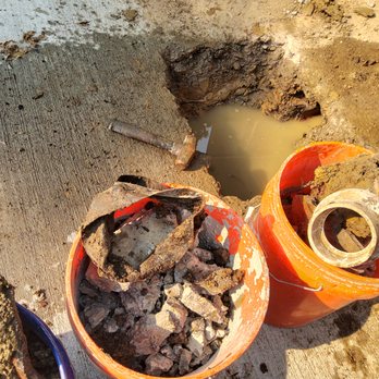 Wood Fundi Paving - Inner tube used to conceal damaged drain - Masonry/Concrete Near Me - Cincinnati, Ohio