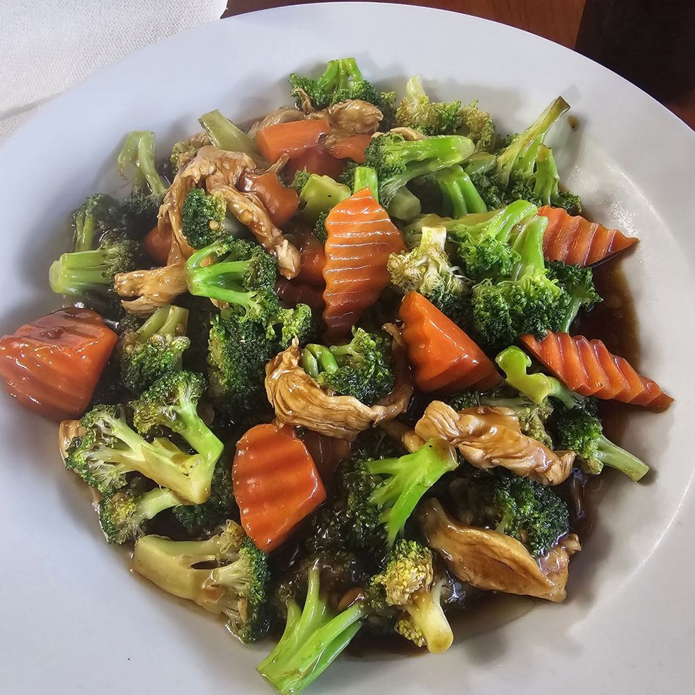 a plate of stir fried vegetables