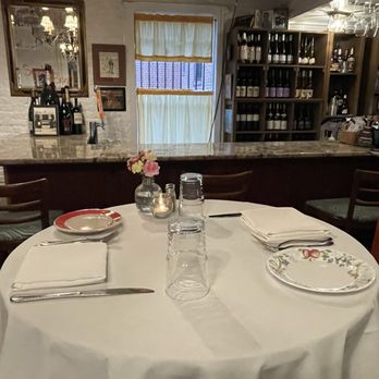 Omar's Carriage House - 1st floor dining - bar area & high top dining table - New American Near Me - Norfolk, Virginia