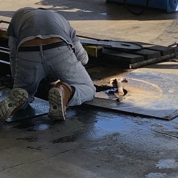 Azusa Hand Car Wash - Man fixing broken chain causing extreme delay. - Car Wash Near Me - Azusa, California Azusa Hand Car Wash - Man fixing broken chain causing extreme delay. - Car Wash Near Me - Azusa, California