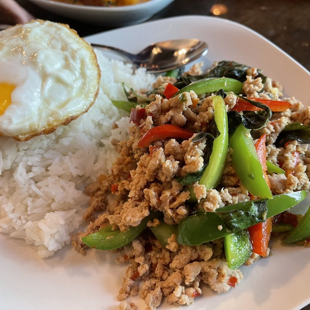 Eggplants Thai Cuisine - Pad Kra Pao, Thai street food style grounded basil chicken. With bell pepper and Thai fried egg. Yummy! - Thai Near Me - Temecula, California Eggplants Thai Cuisine - Pad Kra Pao, Thai street food style grounded basil chicken. With bell pepper and Thai fried egg. Yummy! - Thai Near Me - Temecula, California
