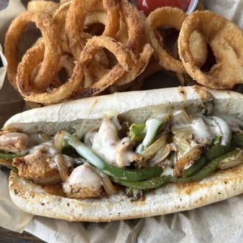 The Burgers - Chicken Philly - pepper jack cheese, grilled onions and peppers with onion rings. - American Near Me - Knoxville, Tennessee The Burgers - Chicken Philly - pepper jack cheese, grilled onions and peppers with onion rings. - American Near Me - Knoxville, Tennessee