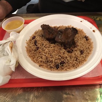 Lena's Roti & Doubles - Regular jerk chicken with rice - Caribbean Near Me - Mississauga, Ontario Lena's Roti & Doubles - Regular jerk chicken with rice - Caribbean Near Me - Mississauga, Ontario