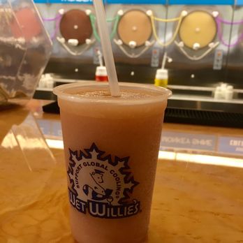 Wet Willies's - The "White Russian" daiquiris (vodka, coffee, 190 degrees grain alcohol and ice cream) $7.00 - Bars Near Me - Mobile, Alabama
