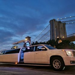 Legendary Limousines - 18 Passenger Yukon Denali with Jet Door!