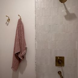 a bathtub and shower a bathtub and shower