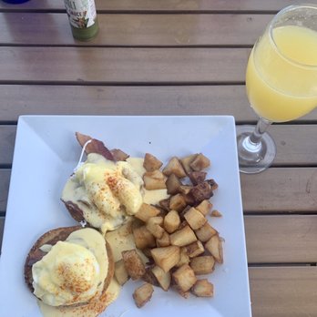 Rick's Reef - Eggs Benedict with Homefries and a mimosa. - Seafood Near Me - St. Pete Beach, Florida