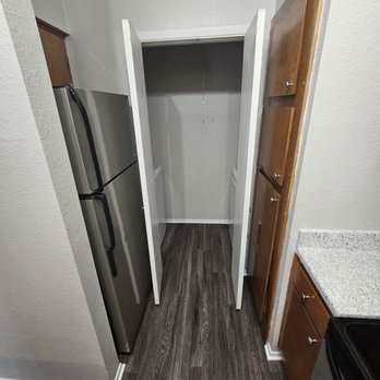 Argosy At Crestview - Laundry area/kitchen. - Apartments Near Me - Austin, Texas