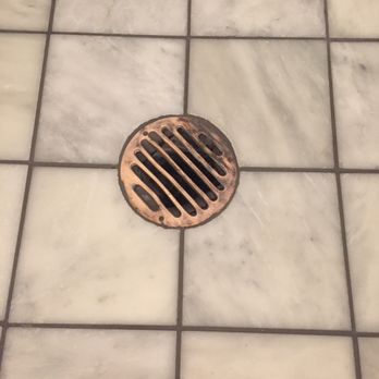 Brent's Custom Tile - Nice drain hole cutout - Tiling Near Me Brent's Custom Tile - Nice drain hole cutout - Tiling Near Me