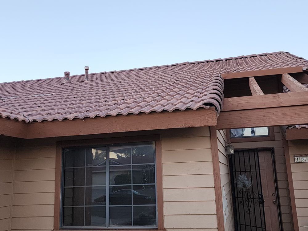 Slide of Defender Roofing 