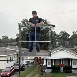 All American Inspections & Testing - "Up in the lift and ready to water test these windows."
