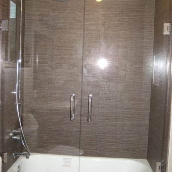 Super Glass - double swing shower door over tub - Windows Installation Near Me - Campbell, California Super Glass - double swing shower door over tub - Windows Installation Near Me - Campbell, California