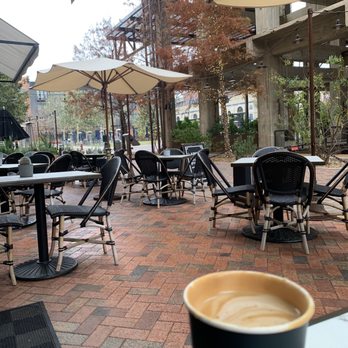 Larder At Emma - Latte on the patio before the rain, - Grocery Near Me - San Antonio, Texas Larder At Emma - Latte on the patio before the rain, - Grocery Near Me - San Antonio, Texas