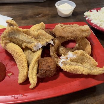Nick's Bar-B-Q & Catfish - SMALL Catfish Dinner - 3 pieces. Regular is 5 and Large is 9. Yummy fish, hush puppies, inion rings and cole slaw. - Barbeque Near Me - Carlisle, Arkansas Nick's Bar-B-Q & Catfish - SMALL Catfish Dinner - 3 pieces. Regular is 5 and Large is 9. Yummy fish, hush puppies, inion rings and cole slaw. - Barbeque Near Me - Carlisle, Arkansas
