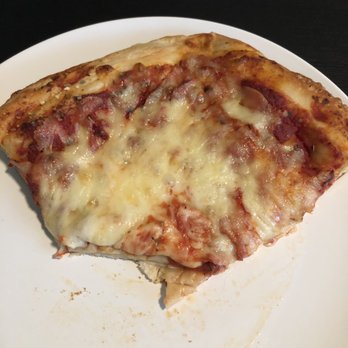 Tony's New York Pizza - Sicilian pizza slice. Cut the corner so I could get a cross section picture of the inside. - Pizza Near Me - Houston, Texas Tony's New York Pizza - Sicilian pizza slice. Cut the corner so I could get a cross section picture of the inside. - Pizza Near Me - Houston, Texas