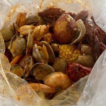 The Kickin' Crab - Kickin' Combo Deal #1 $58.99- 1lb clams/crawfish (frozen)/shrimp (head off/EZ peel/deveined +$2), 2 corn, 2 potatoes, and 4 sausage - Cajun/Creole Near Me - Irvine, California The Kickin' Crab - Kickin' Combo Deal #1 $58.99- 1lb clams/crawfish (frozen)/shrimp (head off/EZ peel/deveined +$2), 2 corn, 2 potatoes, and 4 sausage - Cajun/Creole Near Me - Irvine, California