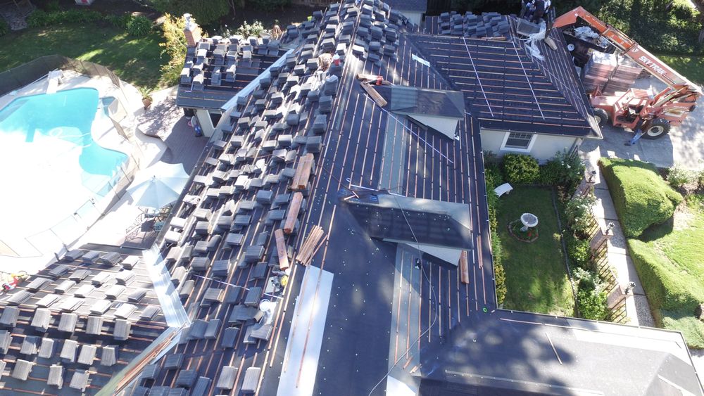 Slide of Freeman Roofing