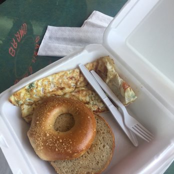 The Bagel Express - My order today is an egg white omelette with tomatoes onions and spinach provolone cheese and multi grain bagel - Bagels Near Me - Kendall, Florida The Bagel Express - My order today is an egg white omelette with tomatoes onions and spinach provolone cheese and multi grain bagel - Bagels Near Me - Kendall, Florida