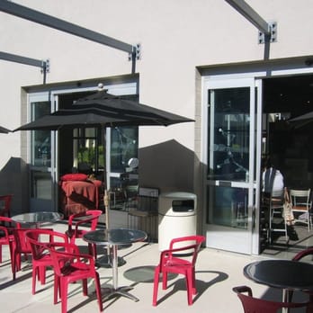 Cyber A Cafe - a patio with tables and umbrellas - Coffee & Tea Near Me - Irvine, California Cyber A Cafe - a patio with tables and umbrellas - Coffee & Tea Near Me - Irvine, California