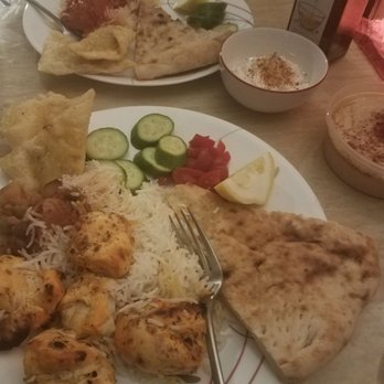 Sameem Afghan Restaurant - chicken kabob, teekah masala, sambosa, naan, hummus (cucumber and tomato are my addition) - Afghan Near Me - Saint Louis, Missouri Sameem Afghan Restaurant - chicken kabob, teekah masala, sambosa, naan, hummus (cucumber and tomato are my addition) - Afghan Near Me - Saint Louis, Missouri