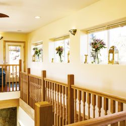 Heaven on Earth Retreat - The Cave Castle's open floor plan features this viewy wooden walkway between bedrooms with views into the sunken granite-walled Cave below.