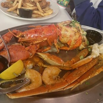 Angie's Seafood - Stuff lobster, snow crab, shrimp and broccoli - Seafood Near Me - Baltimore, Maryland Angie's Seafood - Stuff lobster, snow crab, shrimp and broccoli - Seafood Near Me - Baltimore, Maryland