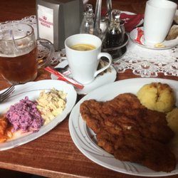 Restauracja Marysia - Traditional Polish meal of Kotlet schabowy with mashed potatoes and mixed salad. Also, a honey beer from the microbrewery.