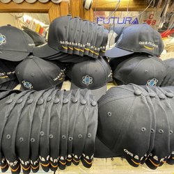 Futura Embroidery, Screen Printing & Promotional Solutions - Embroidered hats with business logo