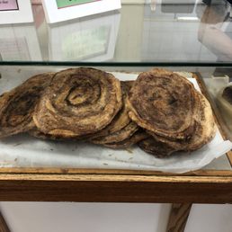 cinnamon buns on a table cinnamon buns on a table