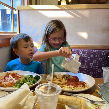 Olive Garden Italian Restaurant - Kids meals and fabulous waitress, letting granddaughter use the cheese grater - Italian Near Me - Sherman, Texas Olive Garden Italian Restaurant - Kids meals and fabulous waitress, letting granddaughter use the cheese grater - Italian Near Me - Sherman, Texas