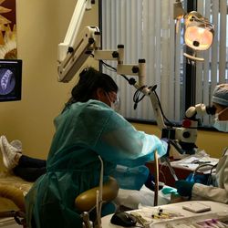 Huntington Beach Microscopic Endodontics - Dr Abbassi working her magic on an emergency patient.