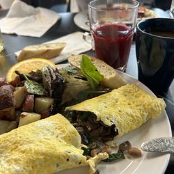Huevos Gourmet - Veggie, mushroom and bean omelette, with a glass of the beet ginger and apple juice.