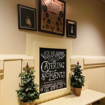 Owen Brennan's - a kitchen with a chalkboard and potted plants - Cajun/Creole Near Me - Memphis, Tennessee Owen Brennan's - a kitchen with a chalkboard and potted plants - Cajun/Creole Near Me - Memphis, Tennessee